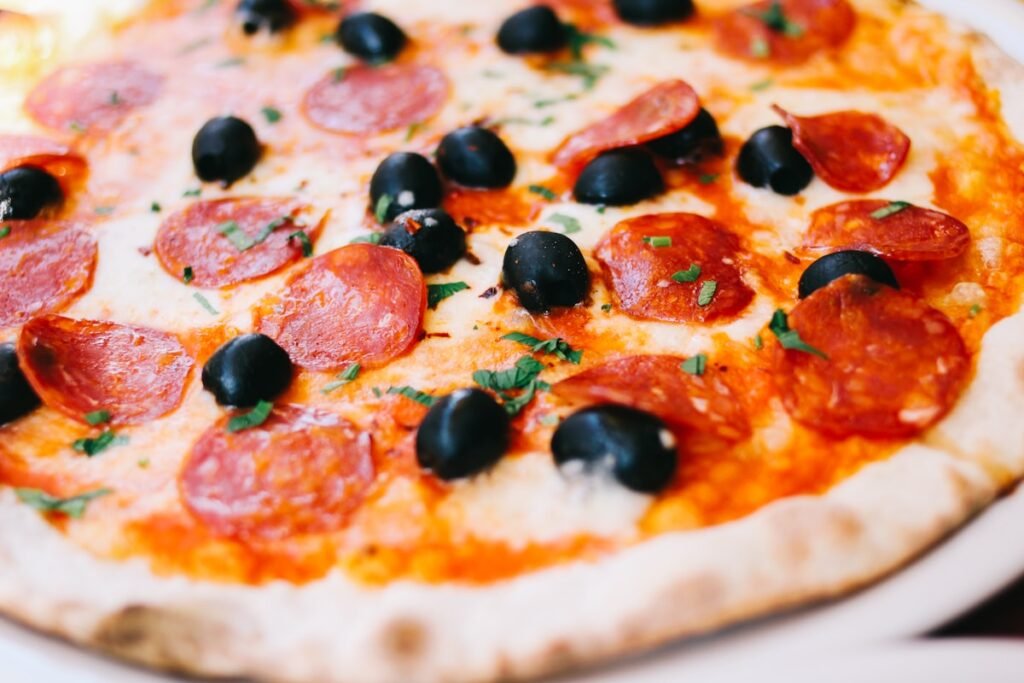 How Long to Preheat a Pizza Oven: Gas and Wood Timings Pizza oven preheating with flames inside the cooking chamber