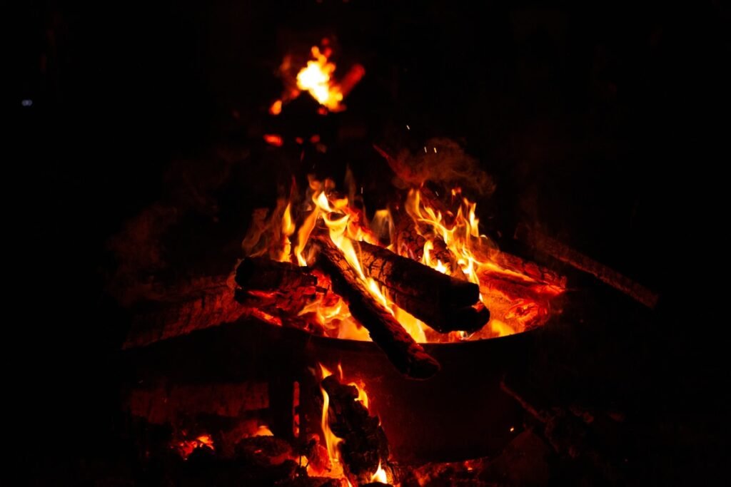 Burning wood fire for pizza oven temperature
